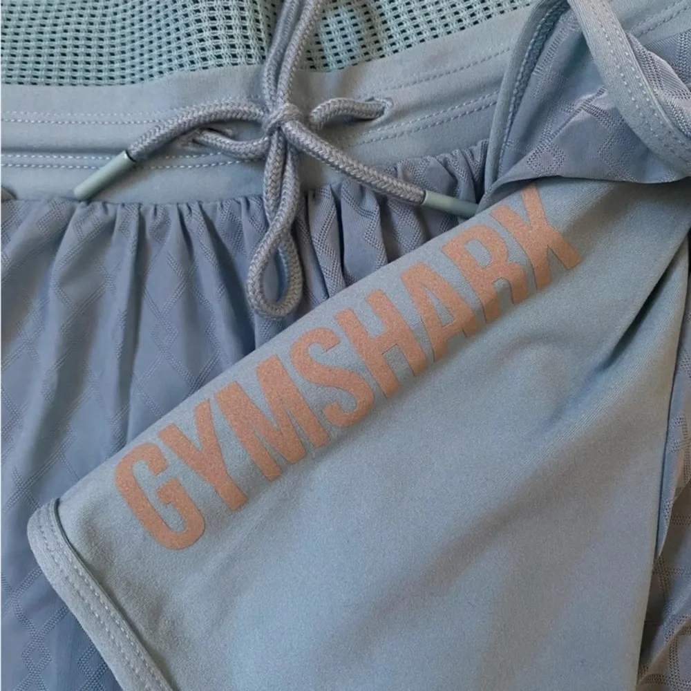 Gymshark Geo mesh two in one shorts in blue‎ size xs